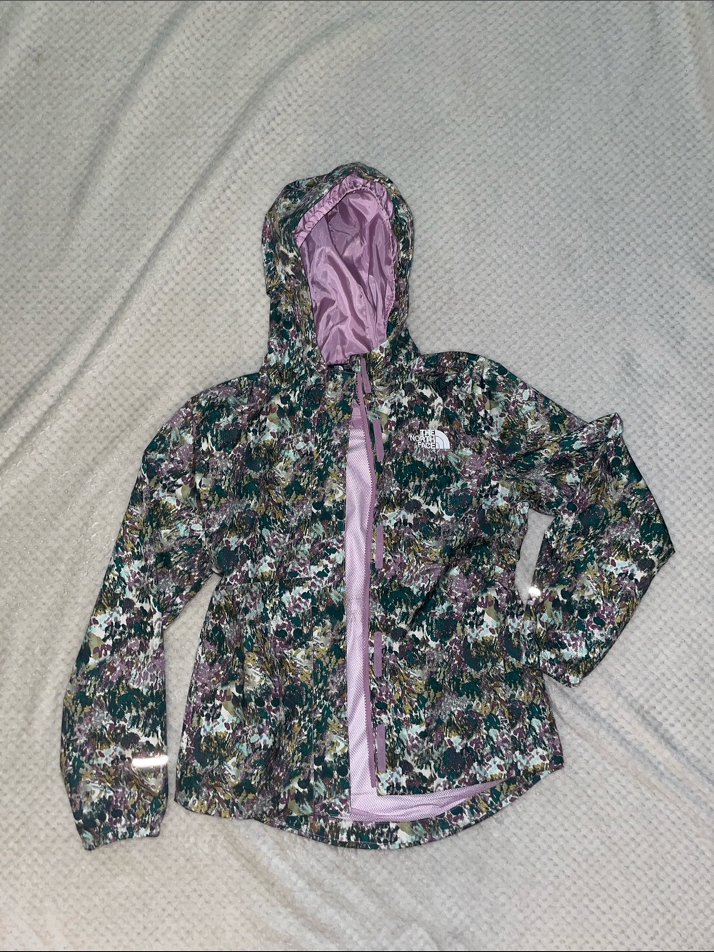 The North Face Floral Hooded Shell Rain Jacket in Purple and Green Kid’s Large